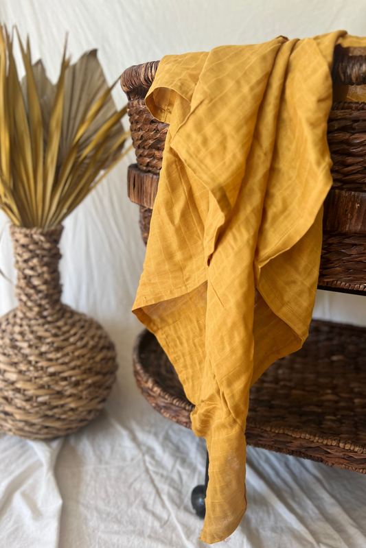 Sunlit Glow Muslin Swaddle